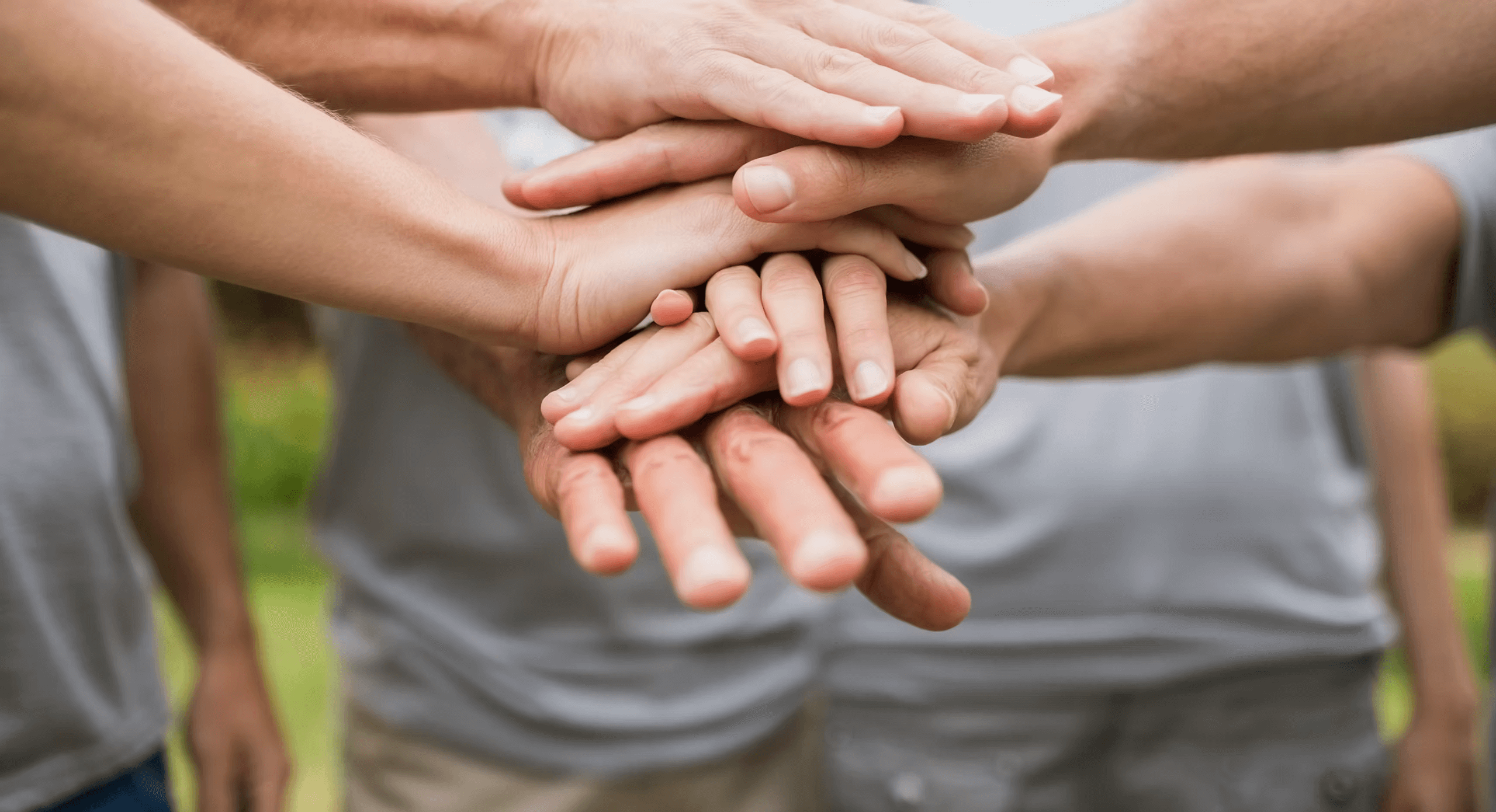 Community hands stacked together